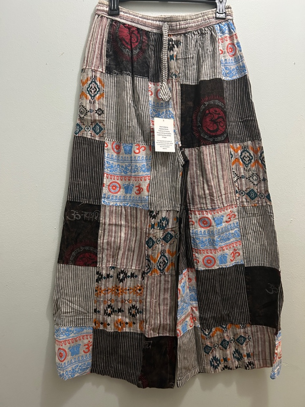 Rising International Patchwork Wide-Leg Joggers in multicolored cropped